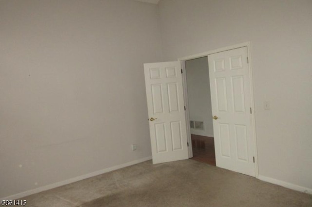 7 Troon Dr, Fredon Twp, NJ 07860 - carpeted empty room featuring baseboards