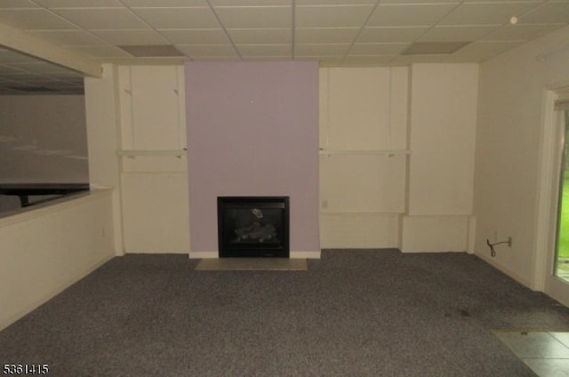 7 Troon Dr, Fredon Twp, NJ 07860 - basement with carpet, a paneled ceiling, and a fireplace with flush hearth