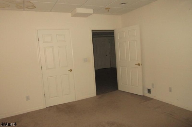 7 Troon Dr, Fredon Twp, NJ 07860 - empty room featuring carpet and a drop ceiling