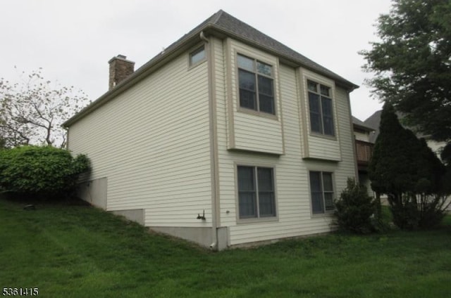 7 Troon Dr, Fredon Twp, NJ 07860 - view of side of property featuring a chimney and a lawn