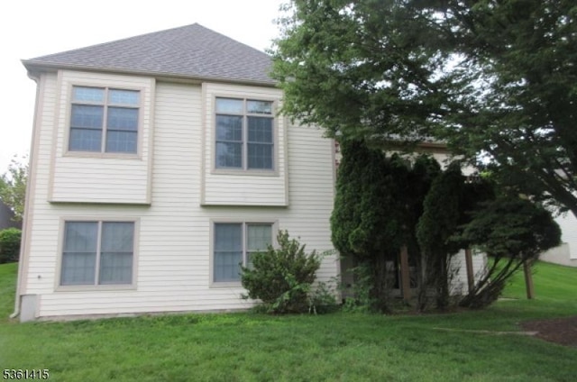 7 Troon Dr, Fredon Twp, NJ 07860 - view of side of property featuring a lawn and a shingled roof