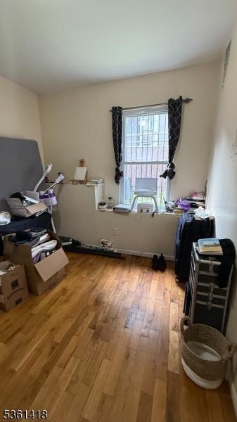 28 1st St, Elizabeth City, NJ 07206 - interior space with wood finished floors