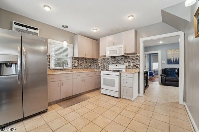 30 Market St, Garfield City, NJ 07026 - kitchen featuring white appliances, a sink, light tile patterned floors, and decorative backsplash