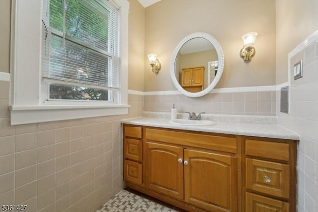 30 Market St, Garfield City, NJ 07026 - bathroom with tile walls, vanity, and healthy amount of natural light