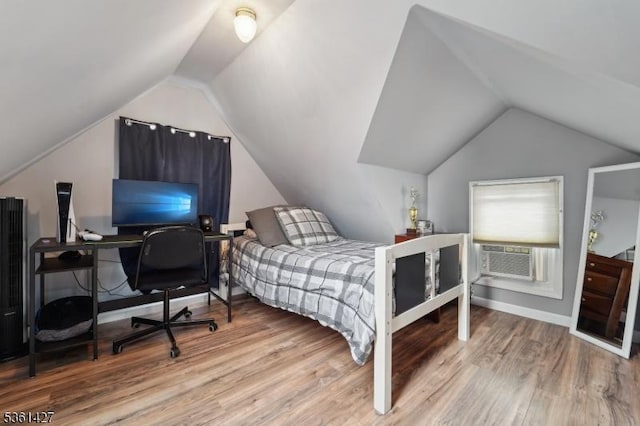 30 Market St, Garfield City, NJ 07026 - bedroom featuring lofted ceiling, wood finished floors, cooling unit, and baseboards