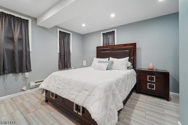 30 Market St, Garfield City, NJ 07026 - bedroom with a baseboard heating unit, recessed lighting, wood tiled floors, and baseboards