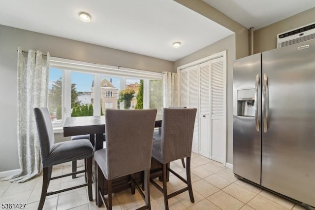 30 Market St, Garfield City, NJ 07026 - dining area with light tile patterned floors and baseboards