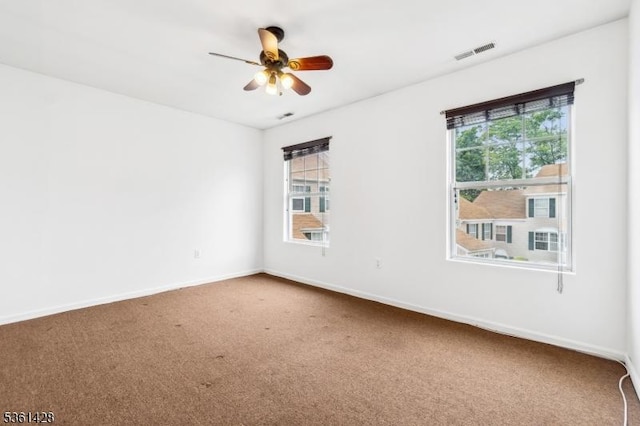 239 40th St Unit 7, Irvington Twp, NJ 07111 - carpeted spare room with a ceiling fan and baseboards