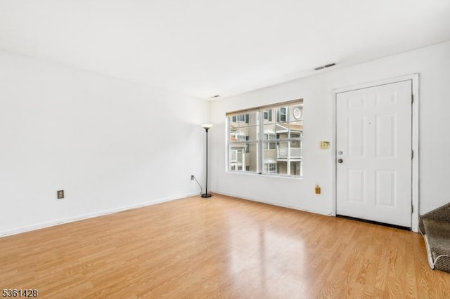 239 40th St Unit 7, Irvington Twp, NJ 07111 - foyer entrance featuring light wood-style floors and baseboards