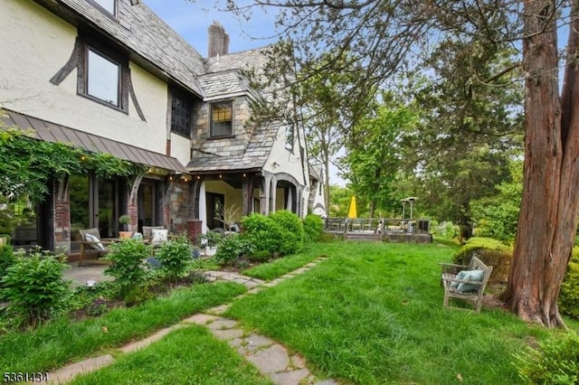 100 Gregory Ave, West Orange Twp, NJ 07052 - view of grassy yard featuring a patio