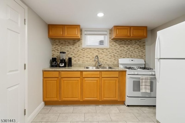 276 5th Ave, Paterson City, NJ 07524 - kitchen with white appliances, a sink, decorative backsplash, light countertops, and light tile patterned flooring