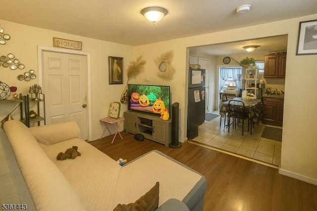 276 5th Ave, Paterson City, NJ 07524 - living room featuring wood finished floors