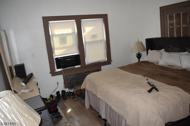 375 Tower St, Union Twp, NJ 07088 - bedroom with wood finished floors, radiator heating unit, and cooling unit