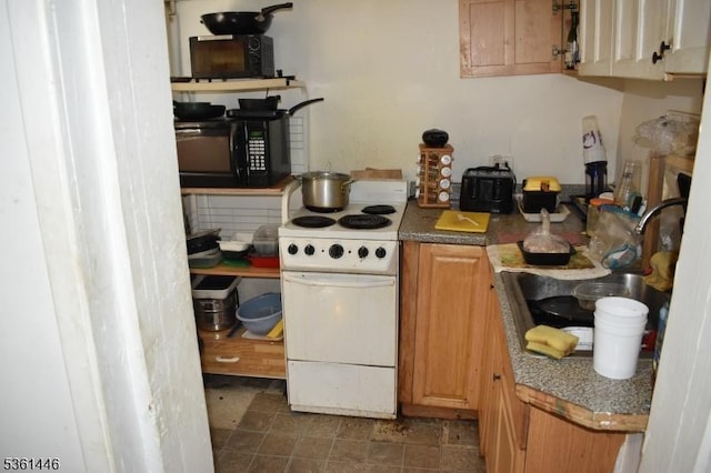 375 Tower St, Union Twp, NJ 07088 - kitchen featuring white electric range oven, black microwave, and a sink