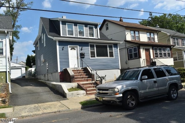 375 Tower St, Union Twp, NJ 07088 - view of front facade featuring an outdoor structure, entry steps, and a detached garage