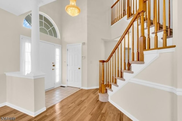 9 Mcgovern Ct, Bridgewater Twp, NJ 08807 - entrance foyer with wood finished floors, a high ceiling, and stairway