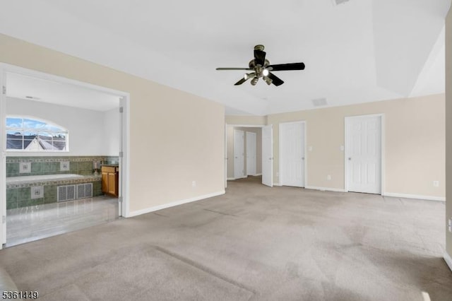 9 Mcgovern Ct, Bridgewater Twp, NJ 08807 - unfurnished bedroom featuring light carpet, ensuite bathroom, two closets, and a ceiling fan