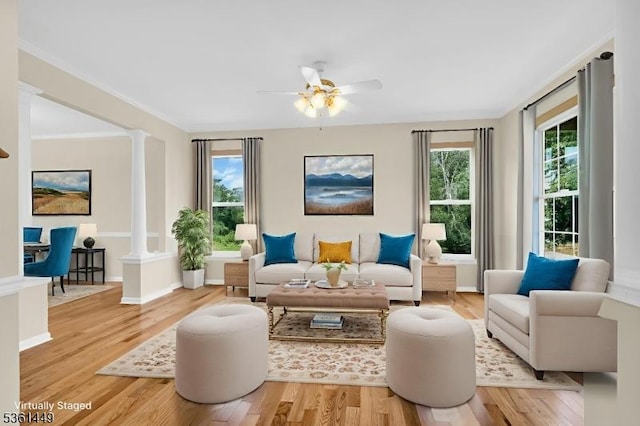 9 Mcgovern Ct, Bridgewater Twp, NJ 08807 - living area featuring decorative columns, light wood-type flooring, and ceiling fan