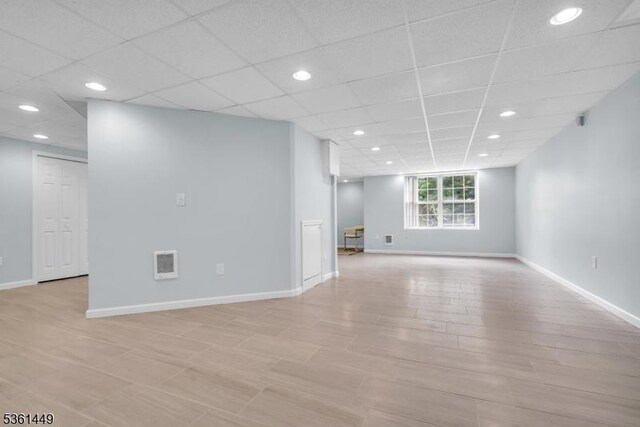 9 Mcgovern Ct, Bridgewater Twp, NJ 08807 - unfurnished room featuring recessed lighting, light wood-type flooring, and a drop ceiling
