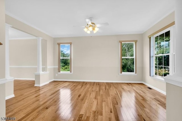 9 Mcgovern Ct, Bridgewater Twp, NJ 08807 - unfurnished room with decorative columns, light wood-type flooring, and a ceiling fan