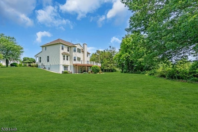 9 Mcgovern Ct, Bridgewater Twp, NJ 08807 - view of grassy yard with a wooden deck