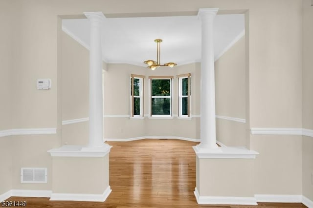 9 Mcgovern Ct, Bridgewater Twp, NJ 08807 - spare room with wood finished floors and a chandelier