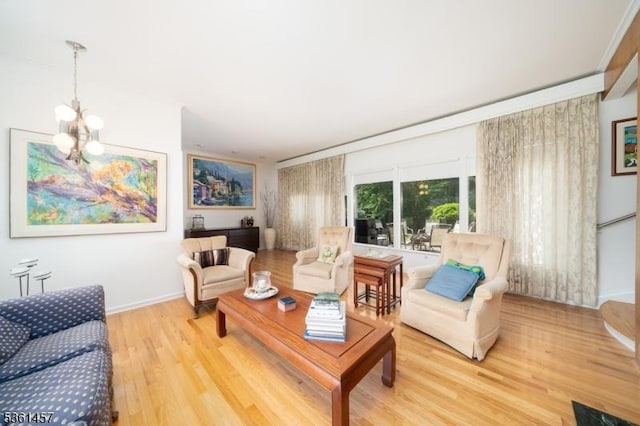 32 Fairway Ave, West Orange Twp, NJ 07052 - living room featuring a chandelier, light wood-type flooring, and baseboards