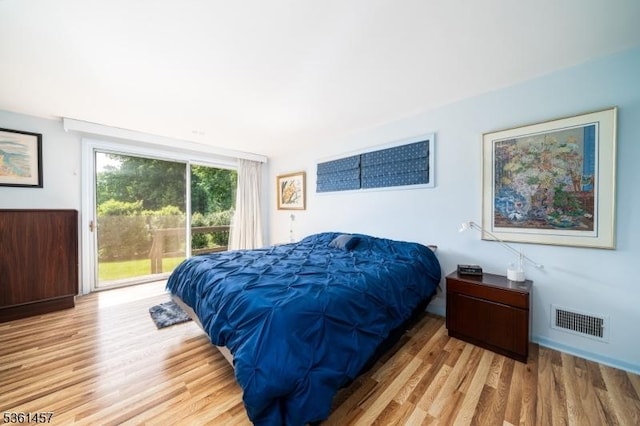 32 Fairway Ave, West Orange Twp, NJ 07052 - bedroom with access to outside and wood finished floors