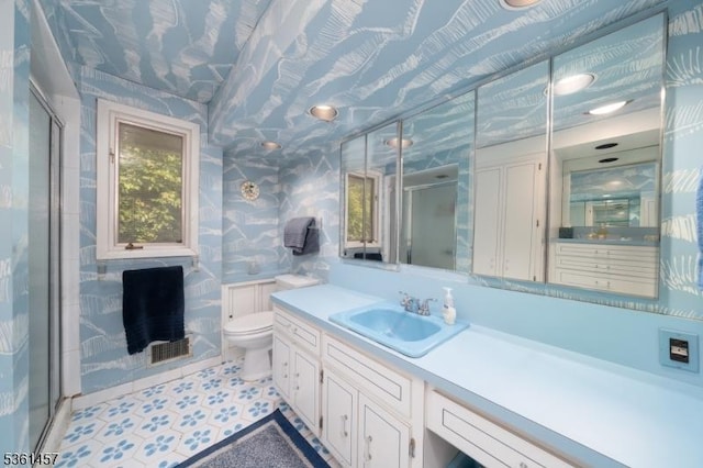 32 Fairway Ave, West Orange Twp, NJ 07052 - bathroom with vanity, a stall shower, and toilet