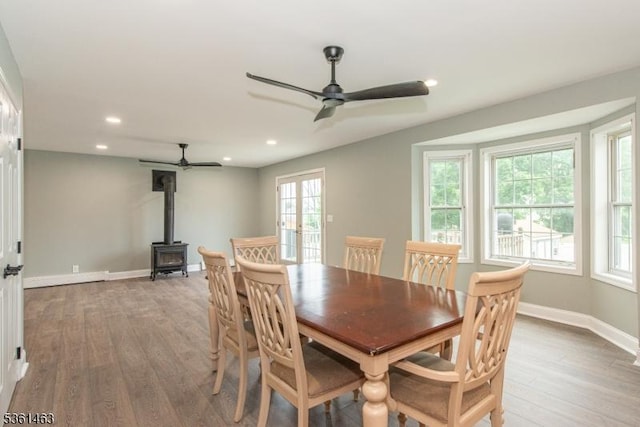 5 Britton St, Netcong Boro, NJ 07857 - dining area with a ceiling fan, a wood stove, wood finished floors, recessed lighting, and baseboards