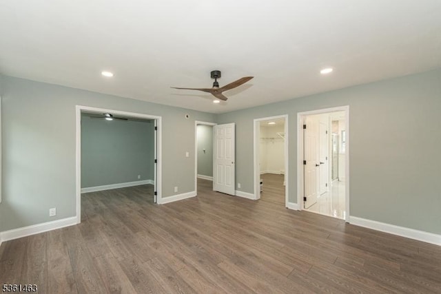 5 Britton St, Netcong Boro, NJ 07857 - unfurnished bedroom featuring a spacious closet, a closet, wood finished floors, baseboards, and recessed lighting