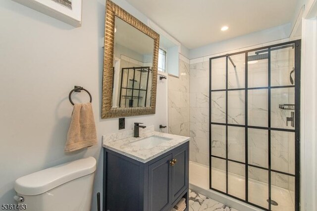 5 Britton St, Netcong Boro, NJ 07857 - bathroom with toilet, vanity, a shower stall, marble look tiles, and recessed lighting