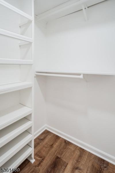 16 Deanna Dr Unit 23, Hillsborough Twp, NJ 08844 - spacious closet with dark wood-style floors