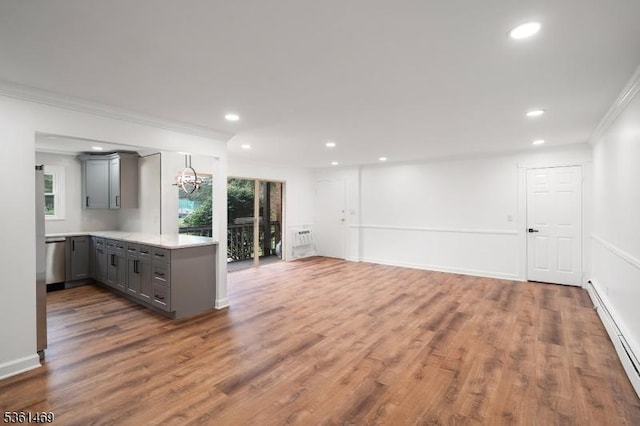 16 Deanna Dr Unit 23, Hillsborough Twp, NJ 08844 - kitchen with gray cabinets, a baseboard radiator, recessed lighting, ornamental molding, and light countertops