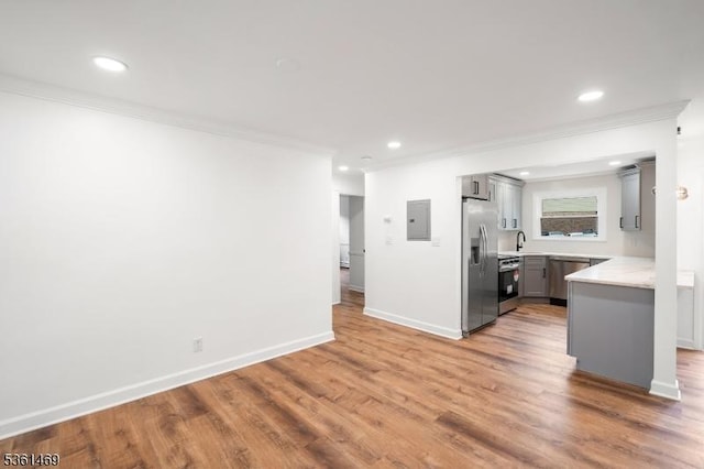 16 Deanna Dr Unit 23, Hillsborough Twp, NJ 08844 - kitchen featuring stainless steel appliances, gray cabinetry, crown molding, electric panel, and recessed lighting