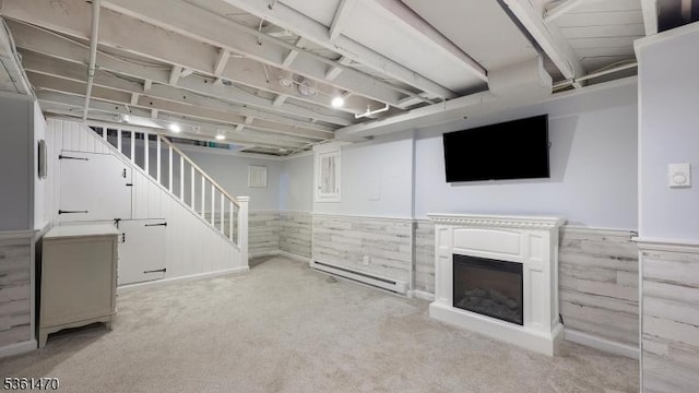 23 Laurel Pl, Fanwood Boro, NJ 07023 - finished below grade area featuring wainscoting, carpet flooring, stairs, a fireplace, and a baseboard heating unit