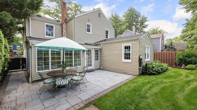 23 Laurel Pl, Fanwood Boro, NJ 07023 - rear view of property with a patio area and a chimney