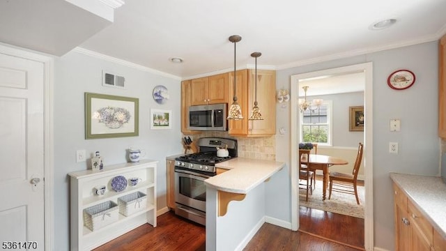 23 Laurel Pl, Fanwood Boro, NJ 07023 - kitchen with appliances with stainless steel finishes, backsplash, light countertops, dark wood-style flooring, and ornamental molding