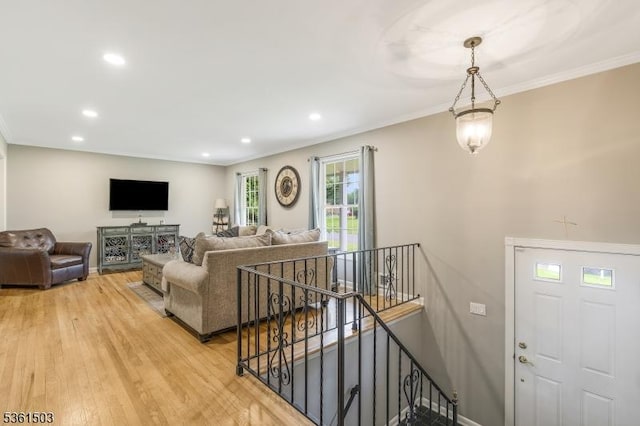 1730 Arrowbrook Dr, Bridgewater Twp, NJ 08836 - living room with light wood-style floors, ornamental molding, and recessed lighting