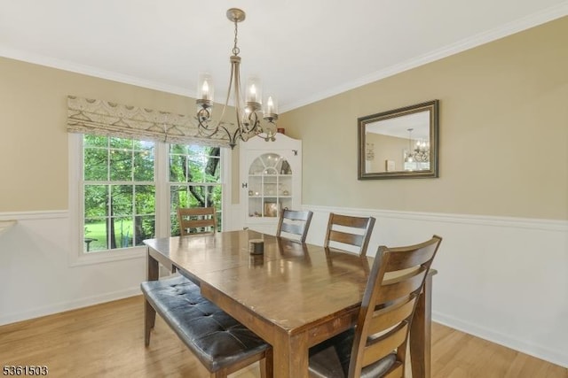 1730 Arrowbrook Dr, Bridgewater Twp, NJ 08836 - dining space featuring a chandelier, light wood-style flooring, and crown molding