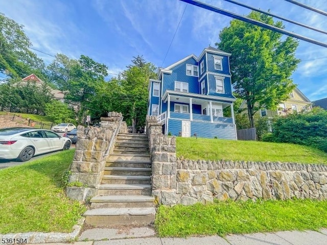 80 Western Ave, Morristown Town, NJ 07960 - victorian home featuring stairs, a porch, and a front lawn