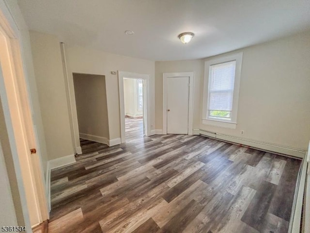 80 Western Ave, Morristown Town, NJ 07960 - unfurnished room featuring healthy amount of natural light, wood finished floors, baseboard heating, and baseboards