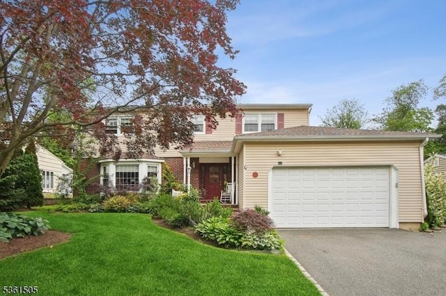 52 Hawthorne Ave, Springfield Twp, NJ 07081 - view of front facade with driveway, a front lawn, and an attached garage
