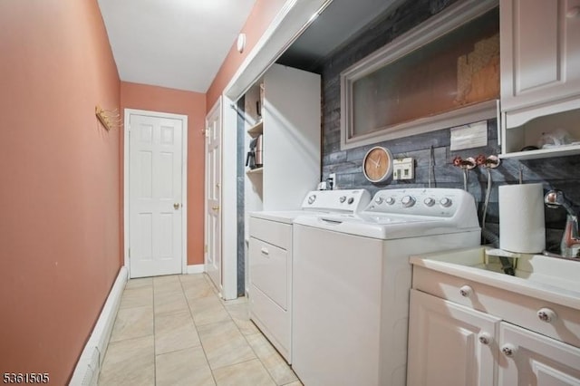 52 Hawthorne Ave, Springfield Twp, NJ 07081 - washroom featuring washing machine and clothes dryer, cabinet space, and baseboards