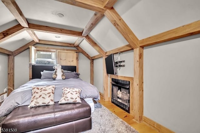 140 Lambertville Hopewell Rd, East Amwell Twp, NJ 08525 - bedroom with lofted ceiling, light wood-style floors, and a fireplace with flush hearth