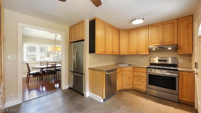 2052 Church Ave, Scotch Plains Twp, NJ 07076 - kitchen with stainless steel appliances, under cabinet range hood, a sink, a ceiling fan, and light brown cabinets