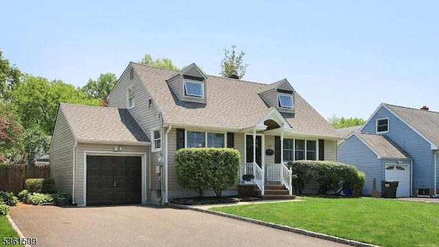 2052 Church Ave, Scotch Plains Twp, NJ 07076 - new england style home with a garage, asphalt driveway, and a shingled roof