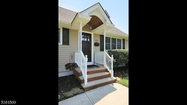2052 Church Ave, Scotch Plains Twp, NJ 07076 - doorway to property featuring roof with shingles