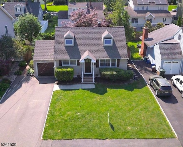 2052 Church Ave, Scotch Plains Twp, NJ 07076 - view of front of home with a residential view, asphalt driveway, a front yard, and a garage