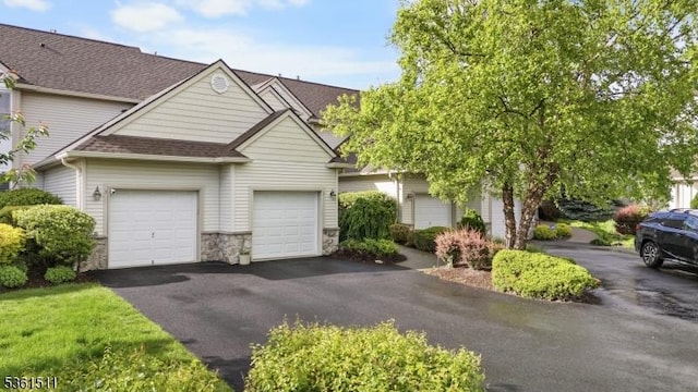 5 Caleb Ct, Hardyston Twp, NJ 07419 - view of front facade featuring asphalt driveway, roof with shingles, a garage, and stone siding